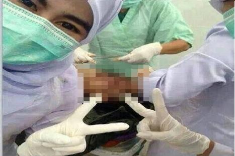 Nữ y tá xin lỗi vì chụp ảnh 