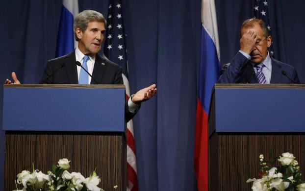 Ngoại trưởng Mỹ John Kerry (trái) và người đồng nhiệm của Nga Sergey Lavrov phát biểu trong cuộc họp báo trước khi tham gia cuộc thảo luận về vấn đề Syria tại Geneva, Thụy Sĩ.