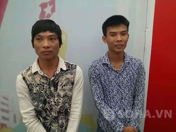 Tại chốt 141, Phạm Văn Lượng (trái) thản nhiên mỉm cười