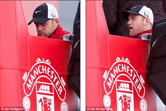 
	Rooney kém vui trong lễ diễu hành ăn mừng chức vô địch Premier League 2012/13 của Man United