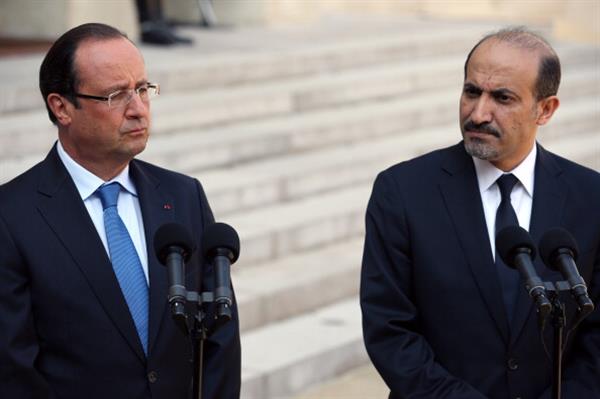 	Tổng thống Pháp Francois Hollande (trái) và lãnh đạo Liên minh Dân tộc đối lập Syria Ahmed Al-Jarba trong cuộc họp báo tại Paris ghôm 28/8.
