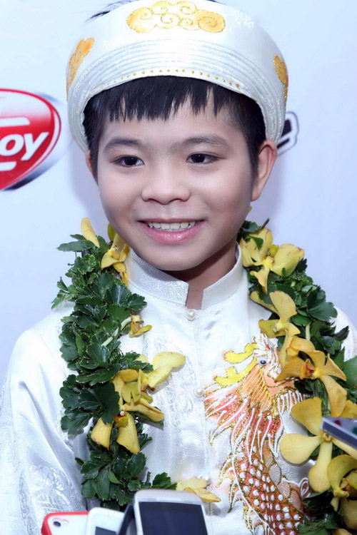  	Quang Anh trong đêm đăng quang The Voice Kids 2013