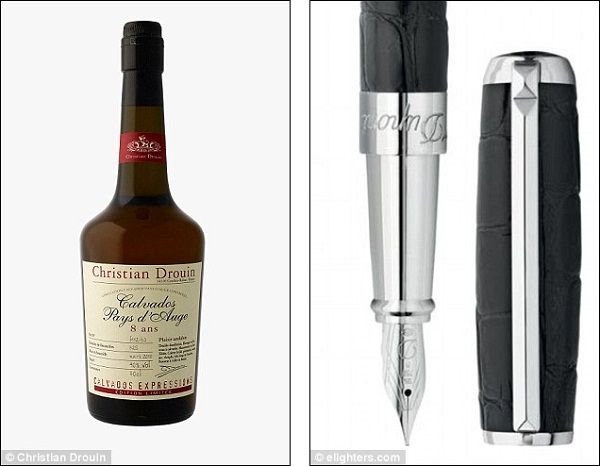 
	Một chai rượu Christian Drouin Pays d'Auge và chiếc bút máy S.T. Dupont...