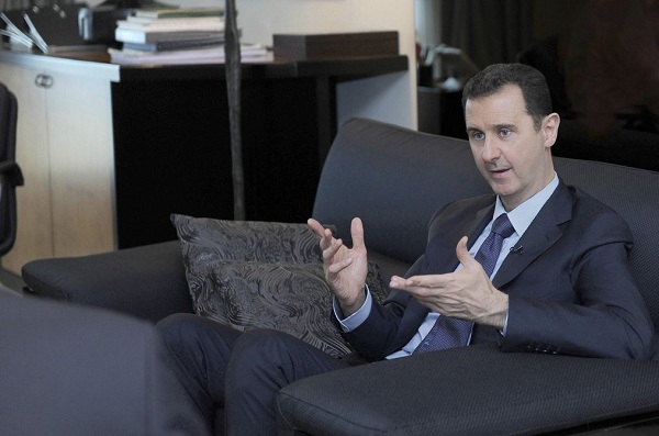 
	Hình ảnh mới nhất của Tổng thống Syria al-Assad trong lần trả lời phỏng
	vấn tờ báo Izvestia của Nga tại Damascus được đăng trên SANA ngày 26/8