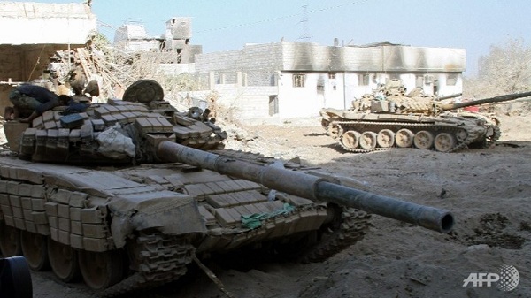 	Xe tăng của quân đội Syria được triển khai tại Jobar, gần Damacus hôm 24/8.