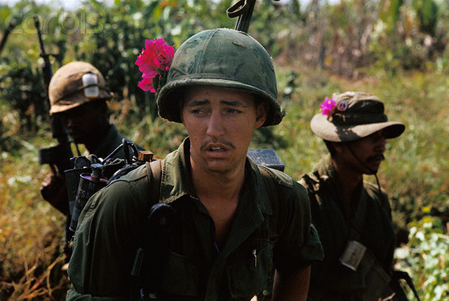 23 Jan 1970, Tan Am, South Vietnam --- GIs of the U.S. Ninth Infantry, 3rd Battalion, air-mobile unit carry out routine delta operation here January 23rd. The area is southwest of Saigon near the Cambodian border. Troops are picking their way through swamps, forming patrols, etc. --- Image by © Bettmann/CORBIS