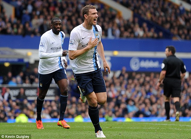 Edin Dzeko là người hùng của Man City đêm qua