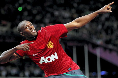 Usain Bolt thi chung kết 100m ở Olympic vẫn không quên... Man United - Ảnh 1.