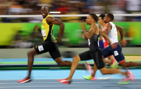 TIẾT LỘ: Usain Bolt từng thắng trong cuộc đua với... taxi - Ảnh 1.