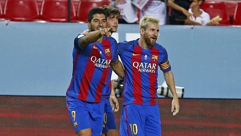 Messi và Suarez giúp Barca thắng ngược Sevilla, tiếp tục bám sát Real Madrid - Ảnh 1.