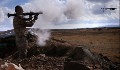 Tiếp viện Quân đội Syria đổ về tỉnh Homs, quyết diệt IS tại Palmyra - Ảnh 1.
