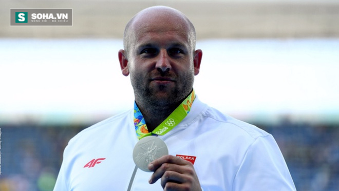 Nhói lòng sao Olympic phải bán huy chương để chữa ung thư cho con - Ảnh 1.