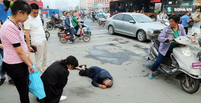 Trung Quốc ban hành luật lạ, hi vọng xóa đi thói vô cảm dần ăn sâu vào máu dân mình - Ảnh 1.