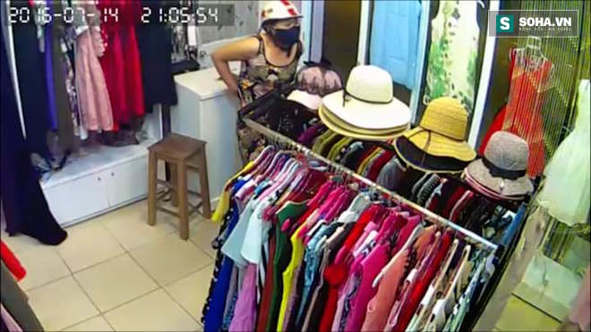 Nghệ An: Clip nữ đạo chích vào hàng loạt shop quần áo để móc ví - Ảnh 4.