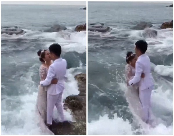 Clip: Ra biển chụp ảnh cưới, đôi trẻ bị sóng lớn hạ đo ván đến thảm hại - Ảnh 2.
