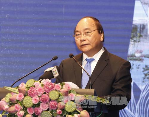 Thủ tướng Nguyễn Xuân Phúc: Chính phủ kiến tạo đang lan tỏa tại Hà Nội - Ảnh 1.