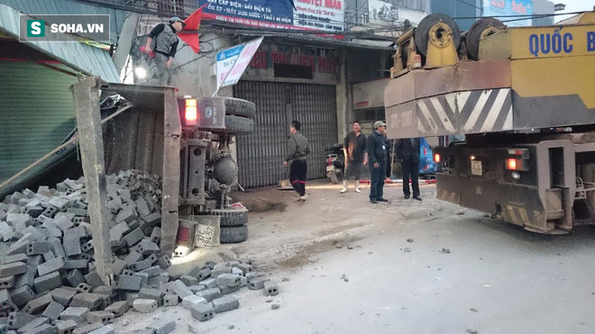 Nghệ An: Xe tải tông sập cửa hàng kinh doanh, tài xế mắc kẹt trong ca bin - Ảnh 3.
