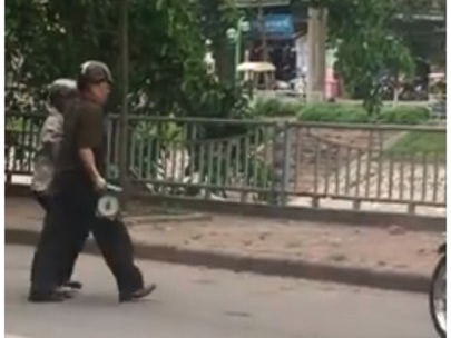 Hà Nội: Cán bộ tự quản phường ném cân của chị bán hàng rong xuống sông Tô Lịch - Ảnh 1.