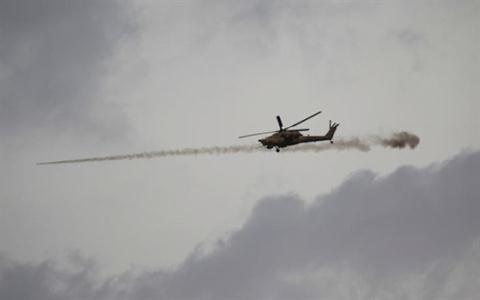 Nghi vấn trực thăng Mi-28 bị bắn hạ tại Mosul - Ảnh 1.