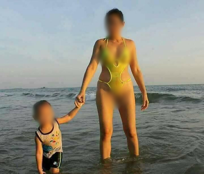 Truy tìm nguồn gốc bức ảnh người phụ nữ mặc bikini hở hang gây sốc trên bãi biển - Ảnh 1.