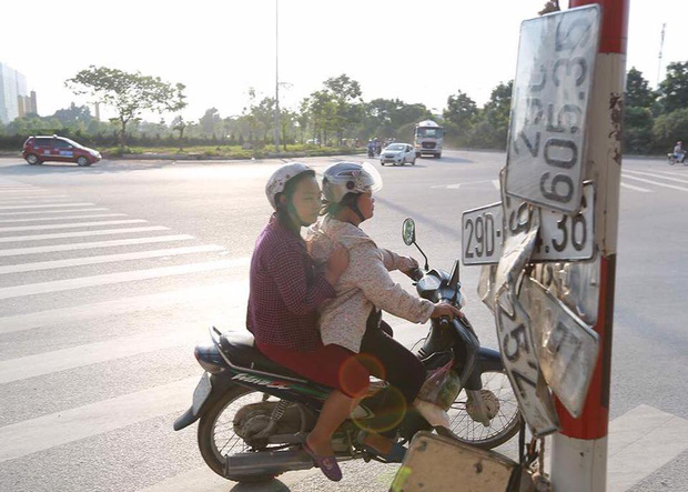 Nghề kiếm tiền mới sau mùa ngập lụt ở Hà Nội: Chuộc lại biển kiểm soát - Ảnh 2.