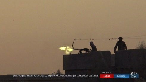 Người Kurd tấn chiếm trung tâm Raqqa, tuyến phòng thủ IS sụp đổ - Ảnh 1.