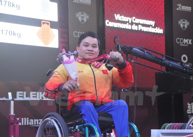Việt Nam giành thêm huy chương tại Giải vô địch cử tạ người khuyết tật - Ảnh 1.