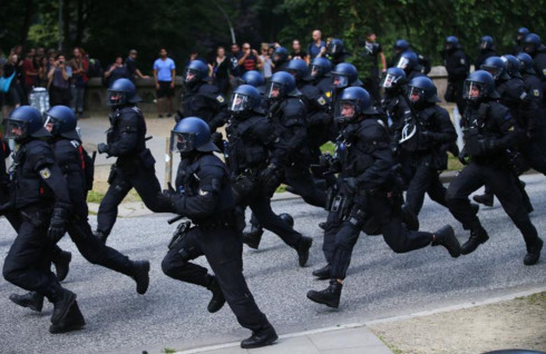 Ảnh: Bạo lực kinh hoàng phủ bóng đen lên Hội nghị Thượng đỉnh G20 - Ảnh 14.