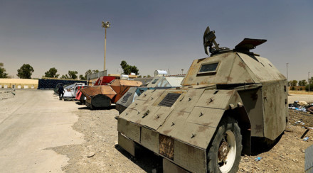 Mục sở thị những chiếc “xe bọc thép” tự chế kỳ dị của IS ở Mosul - Ảnh 3.