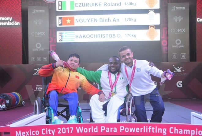 Việt Nam giành thêm huy chương tại Giải vô địch cử tạ người khuyết tật - Ảnh 2.