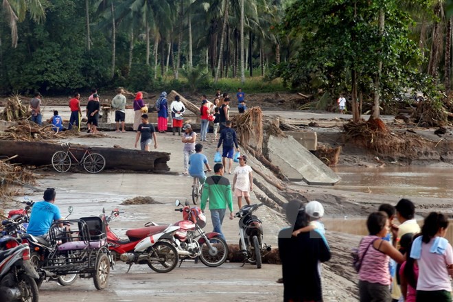 [Photo] Bão Tembin tàn phá, gây ngập lụt khắp nơi tại Philippines - Ảnh 3.