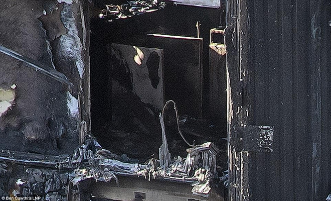 Những hình ảnh đầu tiên cho thấy khung cảnh hoang tàn bên trong tòa tháp 24 tầng sau vụ hỏa hoạn nghiêm trọng - Ảnh 4.