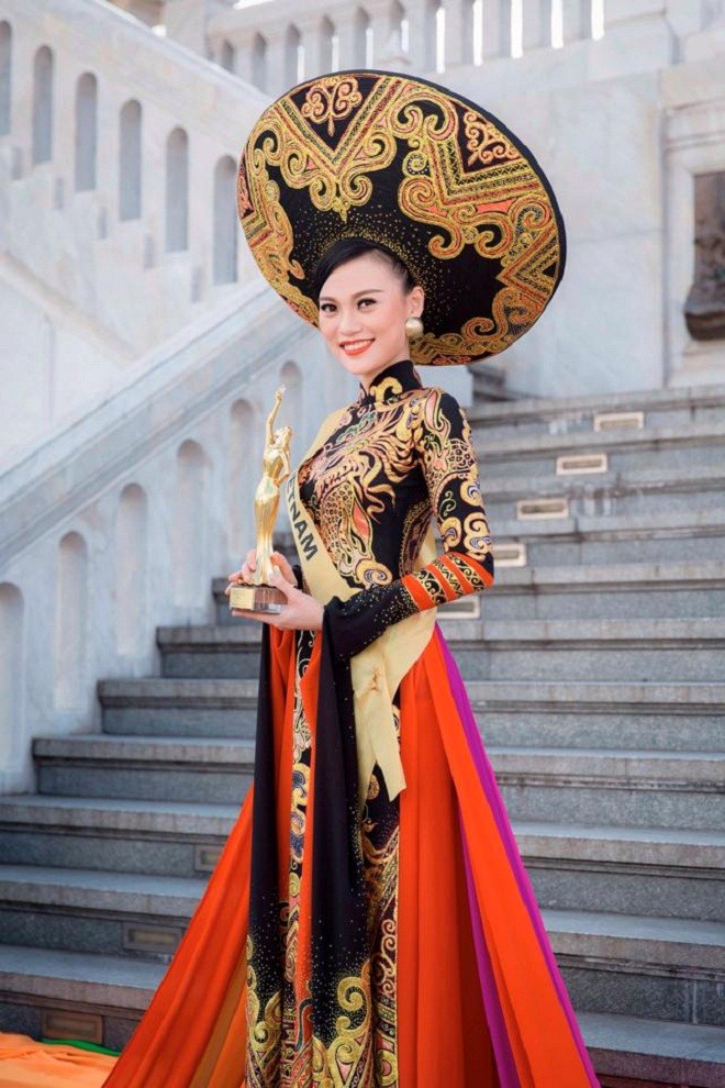 Điểm danh loạt nhan sắc Việt từng tham gia đấu trường Miss Grand International - Ảnh 4.