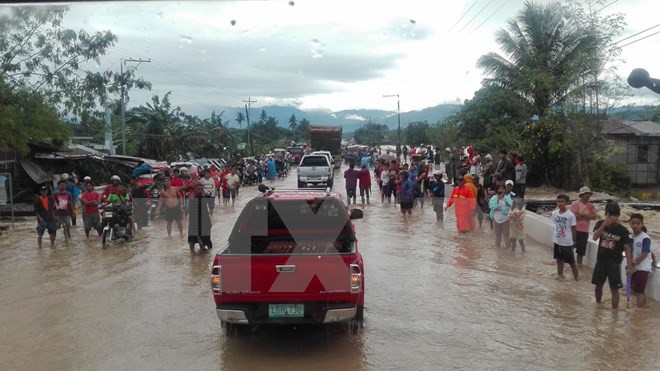 [Photo] Bão Tembin tàn phá, gây ngập lụt khắp nơi tại Philippines - Ảnh 5.
