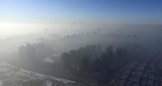 Ô nhiễm tới mức ngày biến thành đêm ở Trung Quốc - Ảnh 6.