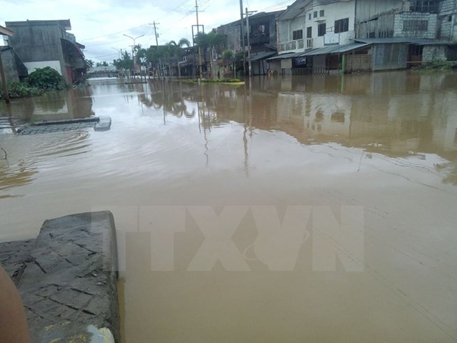 [Photo] Bão Tembin tàn phá, gây ngập lụt khắp nơi tại Philippines - Ảnh 7.
