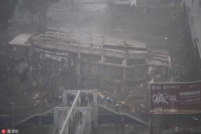 Trung Quốc: Chỉ 5 giây ngắn ngủi đánh sập tòa nhà cao 65m sau hơn 10 năm xây dựng trái phép - Ảnh 9.
