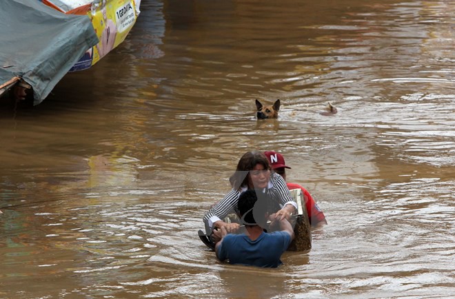[Photo] Bão Tembin tàn phá, gây ngập lụt khắp nơi tại Philippines - Ảnh 8.