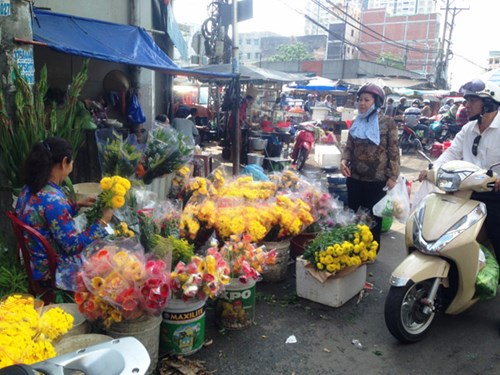 Nhộn nhịp mua cá lóc nướng trong ngày Thần tài - Ảnh 9.