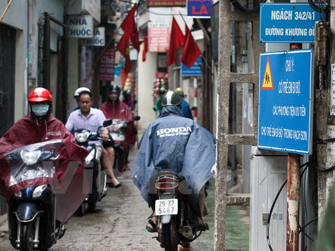 Cận cảnh làn đường ưu tiên BRT trong ngõ đầu tiên ở Hà Nội - Ảnh 9.