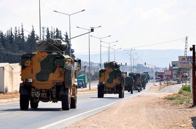 Thổ Nhĩ Kỳ ồ ạt điều binh lính, thiết giáp sang Syria: Khủng bố đầu hàng hoặc phải chết! - Ảnh 1.