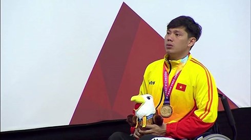 Võ Thanh Tùng phá kỷ lục Asian Para Games 2018 - Ảnh 1.