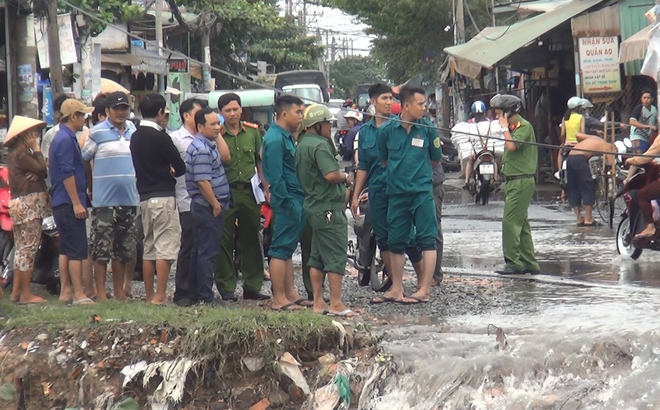 Tìm thấy thi thể nam sinh viên bị nước cuốn mất tích trong cơn bão số 9 ở Sài Gòn - Ảnh 2.