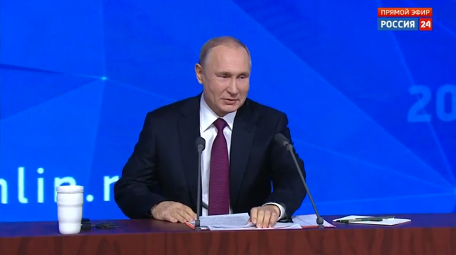 Tổng thống Nga Vladimir Putin đang trả lời họp báo thường niên marathon - Ảnh 1.