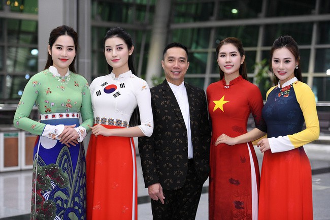Huyền My, Phương Oanh Quỳnh búp bê trình diễn áo dài của NTK Đỗ Trịnh Hoài Nam tại Hàn - Ảnh 2.