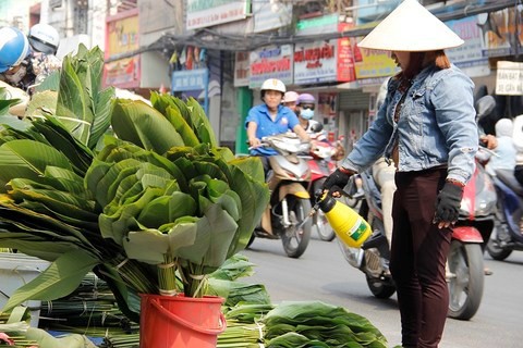 Chợ lá dong nửa thế kỷ ở Sài Gòn nhộn nhịp ngày giáp Tết - Ảnh 11.