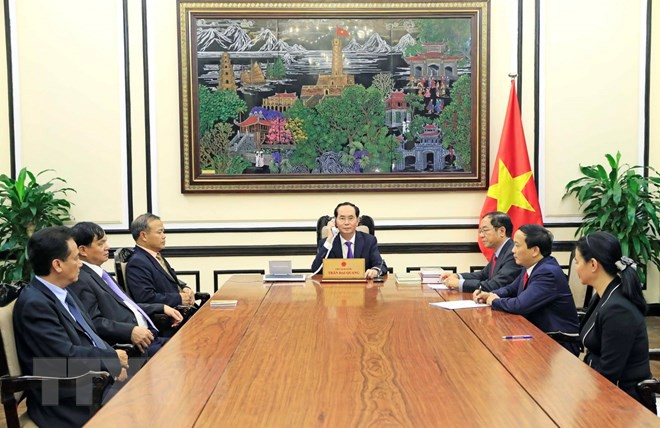 Chủ tịch nước Trần Đại Quang điện đàm với Tổng thống Nga Putin - Ảnh 1.