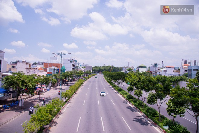 Chùm ảnh: Những ngày này, có một Sài Gòn tĩnh lặng lạ thường khi người dân đã rủ nhau đi trốn - Ảnh 5.