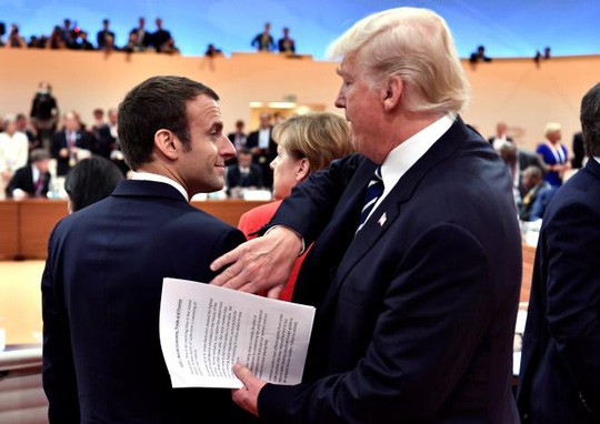 Đằng sau tình huynh đệ Trump - Macron - Ảnh 1.