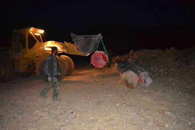 Quân đội Syria chiếm giữ kho vũ khí khủng và tên lửa đạn đạo của phe thánh chiến ở Qalamoun - Ảnh 8.
